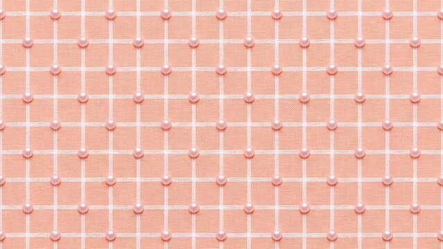 살구색 격자무늬 위에 박힌 진주 알갱이 패턴a pearl grain pattern embedded on an apricot grid