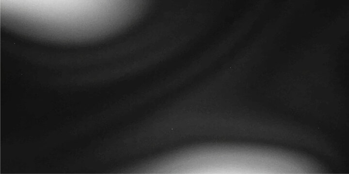 Smooth black satin and silk fabric background featuring a dark metallic texture with a silver wave pattern on a sleek carbon surface design