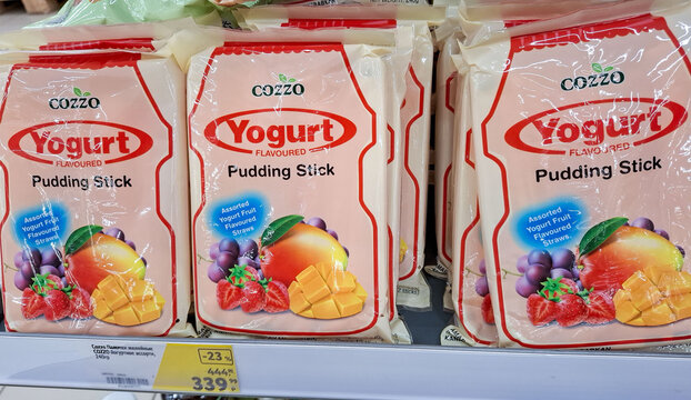 VORONEZH, Russia - March 14, 2026.Cozzo yogurt flavored pudding sticks with mango and strawberry at a Russian store in a grocery aisle