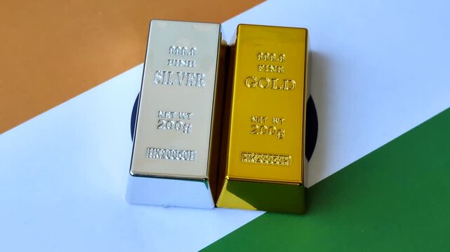 Gold and silver bullion or ingots as metals for bank storage, investments, and financial transactions. Gold and silver bars as a backdrop for your design