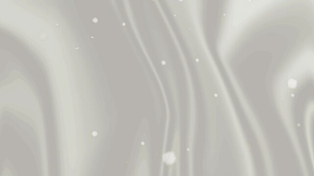 Gray liquid flows with white particles in a natural environment viewed from above