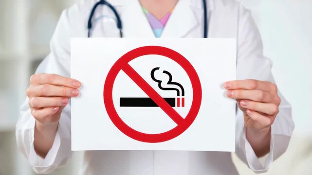 No smoking sign held by healthcare professional, tobacco prohibition health warning, doctor with stethoscope promoting smoke-free environment, No Tobacco Day message on tobacco cessation awareness