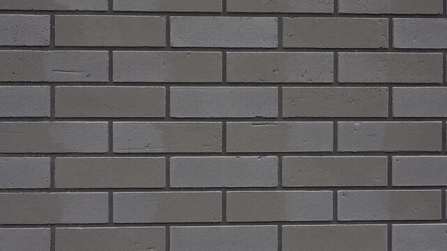 Textured grey brick wall slowly moving creating an abstract background for construction and architecture concept video HD Full