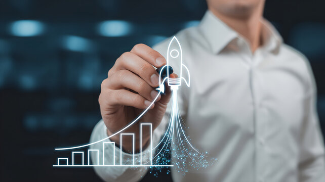 Rocket ship drawing over rising graph business growth concept.