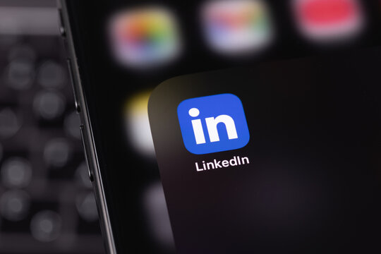 LinkedIn logo mobile icon app on a screen smartphone iPhone closeup. LinkedIn is a social network for finding and establishing business contacts. Batumi, Georgia - March 25, 2026