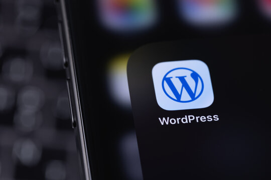 WordPress logo mobile icon app on a screen smartphone iPhone. WordPress - open source site content management system. Batumi, Georgia - March 25, 2026