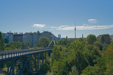 View on the Schwedter Steg bridge and Fernsehturm television tower above the trees of Mauerpark, Berlin, Germany  © Kristof Lauwers