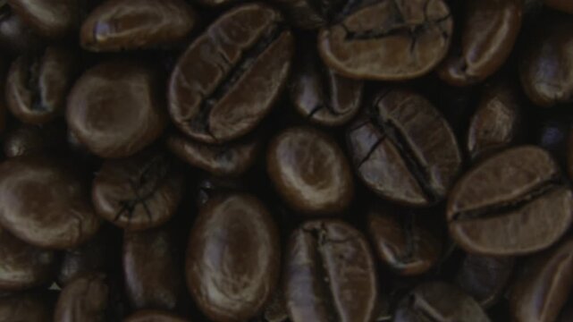 Rotating Coffee Beans With Light Smoke Macro.