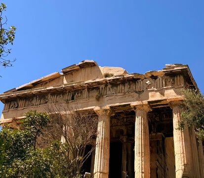 Close up of Parthenon temple over bright blue sky background, Acropolis hill, Athens