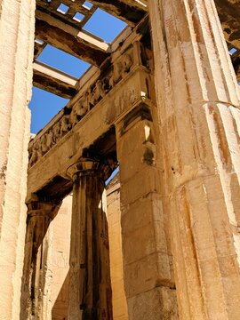 Close up of Parthenon temple over bright blue sky background, Acropolis hill, Athens