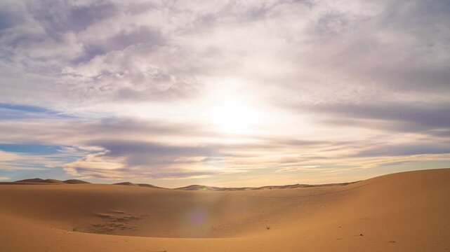 Romantic colorful sunset over the sand dunes in Sahara desert Timelapse