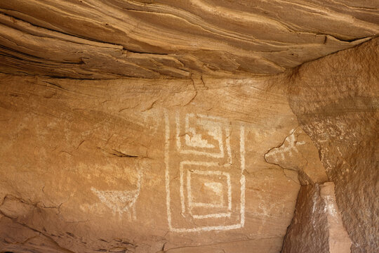 Ancient rock art with geometric patterns and sheep in Hovenweep National Monument, Utah