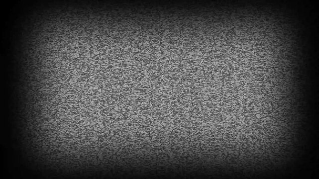 Old Retro TV - Static tv black and white noise caused by bad signal reception. Loop animation 4k video
