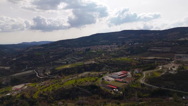 Scenic Aerial Approach to Historic Omodos Village in Limassol District Cyprus