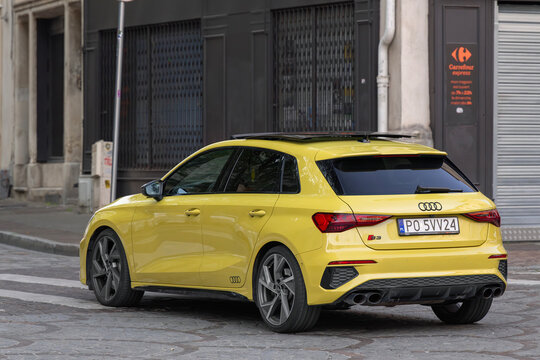 Nancy, France - April 30th 2022 : View on a yellow Audi S3 Sportback driving on a street.