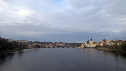 Obraz premium Prague, Czech Republic. Charles Bridge (Czech: Karlův most) is a medieval stone arch bridge that crosses the Vltava river. Its construction started in 1357.