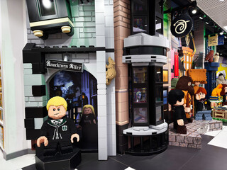 Naklejka premium Lego Knockturn Alley Harry Potter display in a London UK store with brick figures and themed wizard window scene