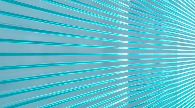 Turquoise horizontal blinds with soft light creating a clean, modern geometric pattern, perfect for backgrounds and interior design concepts.