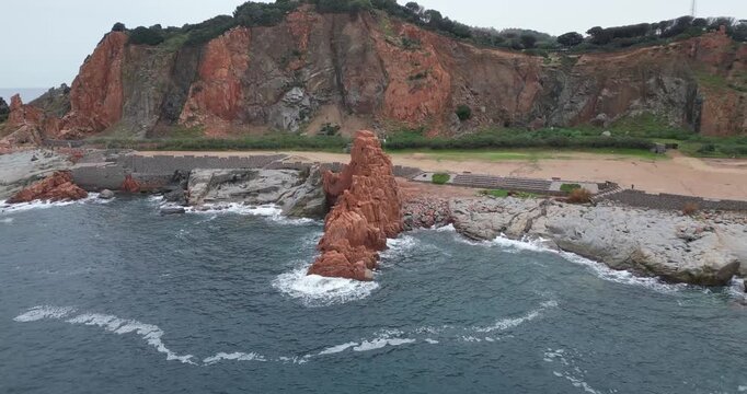 Rocce Rosse red porphyry rock formations in Arbatax, Sardinia, Italy