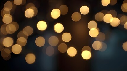 Obraz premium A soft and warm abstract background featuring glowing defocused golden bokeh lights
