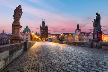 Obraz premium Charles Bridge at Sunrise with Baroque Statues and Old Town Bridge Tower, Prague, Bohemia, Czech Republic