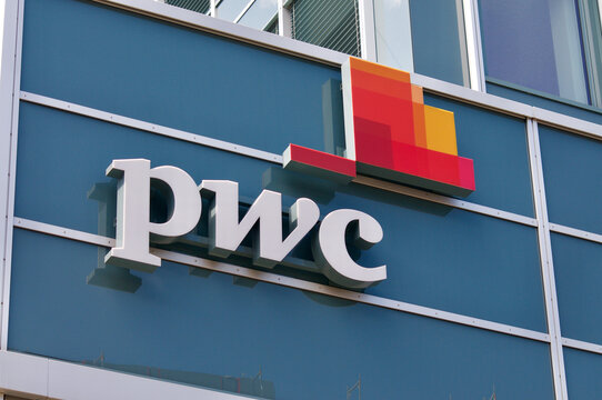PWC or PriceWaterhouseCoopers sign hanging in St. Gallen