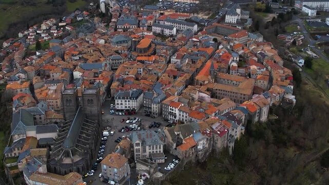 Aerial view of Saint-Flour  in France on a cloudy day in early spring.