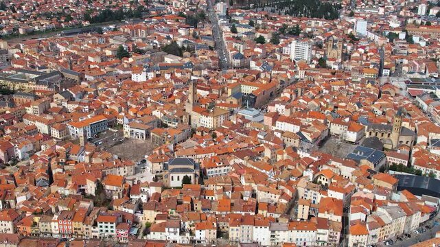 Aerial around the city Millau, 12100, France on a sunny day in early spring.