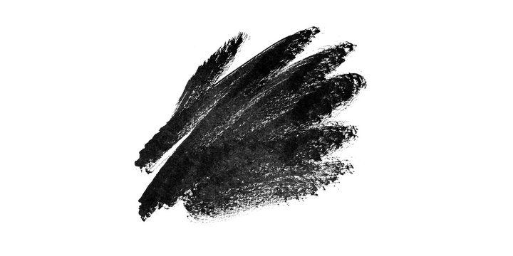 Black charcoal brush stroke on white background