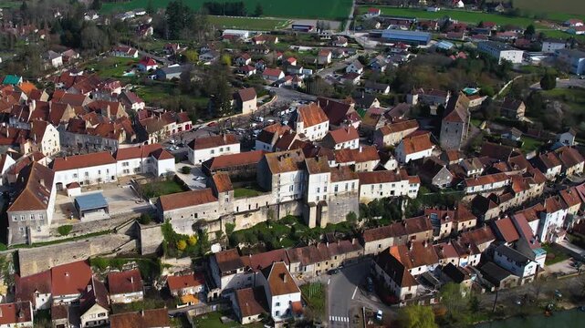 Aerial view of the old town of Pesmes in France on a sunny afternoon in spring.