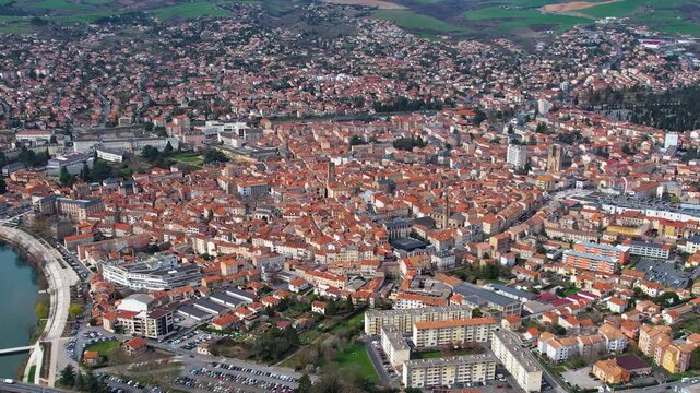 Aerial around the city Millau, 12100, France on a sunny day in early spring.