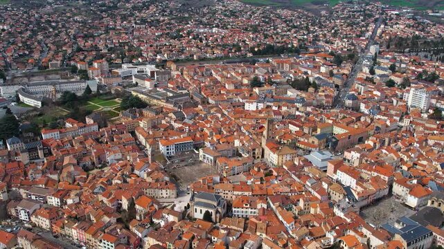 Aerial around the city Millau, 12100, France on a sunny day in early spring.