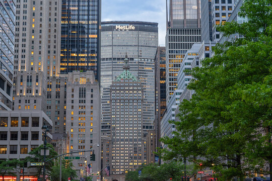 MetLife Building sign above Midtown Manhattan mixed-era skyline at dusk, East 53rd Street, New York City, USA