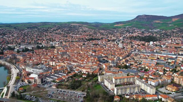 Aerial around the city Millau, 12100, France on a sunny day in early spring.
