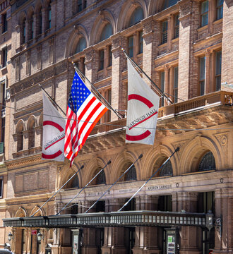 New York City, NY&mdash;June 16, 2018; American and Carnegie Hall flags hang above the historic Carnegie Hall concert venue in Midtown Manhattan.