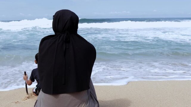 Serene moment of a modest woman reflecting by the sea shore during summer vacation.