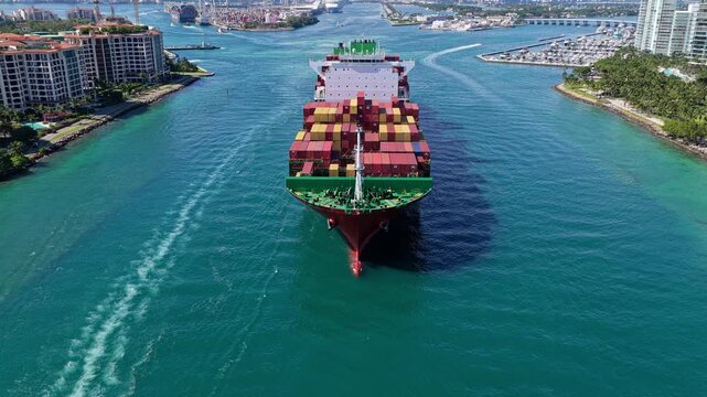 Cargo ship e with container. Freight container loaded on cargo vessel. cargo ship leaving harbor. Container ship.