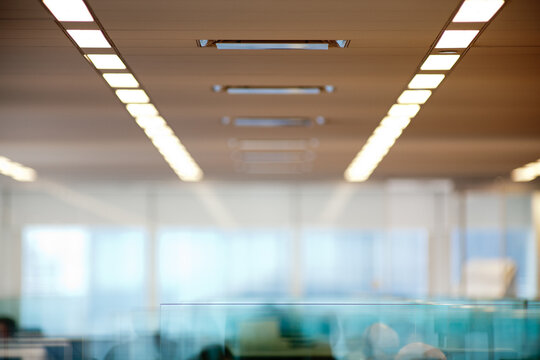Abstract view of office ceiling with frosted glass