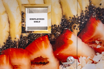 photo mural of berries on emplyees only door © Bill Gallery