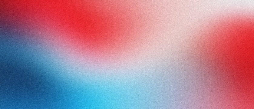 Abstract grainy gradient background with red and blue colors. Soft blurred mesh texture with vibrant patriotic tones. Smooth colorful transition for digital wallpaper and creative web design.
