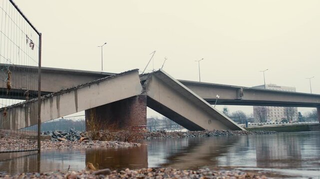 Dresden Carola bridge (Carolabr&uuml;cke) collapsed. Broken infrastructure building above Elbe river. Material damage of reinforced concrete.