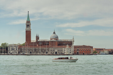 Fototapeta premium MONTERREY, NL, MEXICO - 09 MAY, Spectacular image of naval traffic at sunset on the canals of Venice, Italy