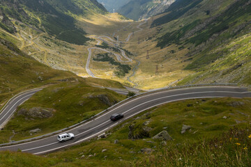 Transfagarasan road and Fagaras mountains view from the Balea Lake, Sibiu, Romania. Transfagarasan is considered one of the most beautiful roads in the world. © Oana
