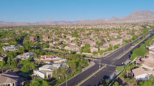 Summerlin Las Vegas Aerial Pullback of Suburban Homes and Red Rock Mountains 01