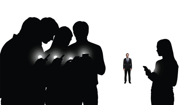 Businessman standing alone while others focus on their phones