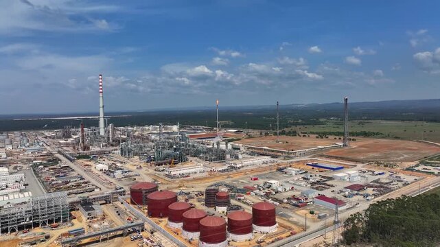 Aerial views highlight the vast oil refinery complex bustling with activity, illustrating crude oil processing, fuel production, and the growing energy market amid rising fuel prices.