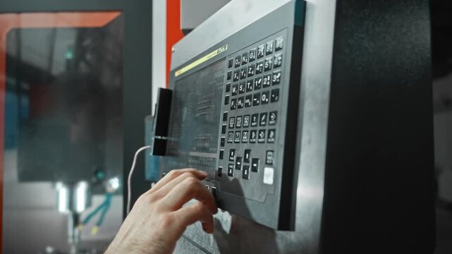 Operator Manages Production With Touch. Factory Floor Reflected In Glass With Active Monitoring Tools