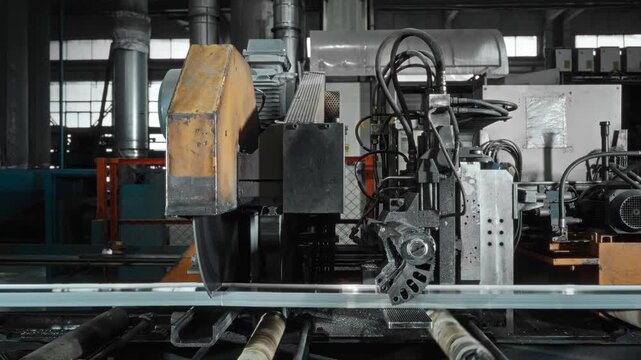 Automation In Aluminum Fabrication. Robotic System Manages Extrusion And Cutting Operations