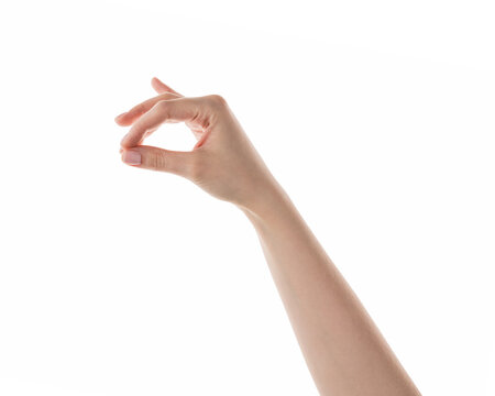 Female hand pick something isolated on white