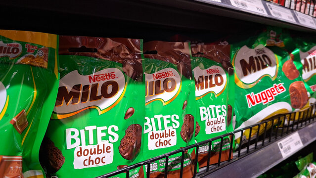 Row of Nestle Milo Bites double choc and Milo Nuggets snack pouches displayed on a retail shelf on May 4, 2026 in Bangkok, Thailand.